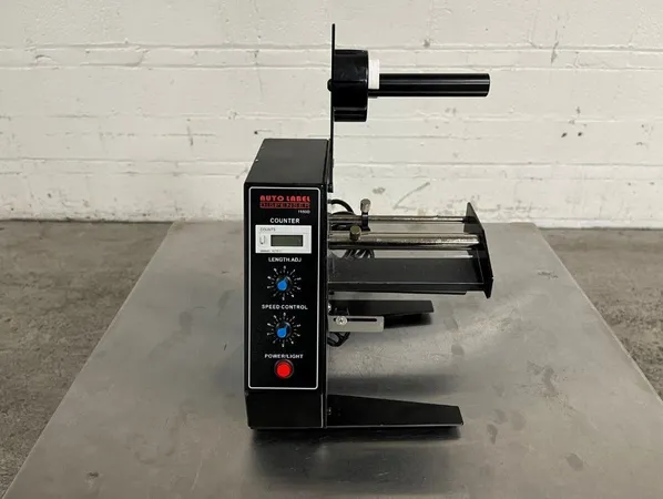 Label dispenser/Roll labeler