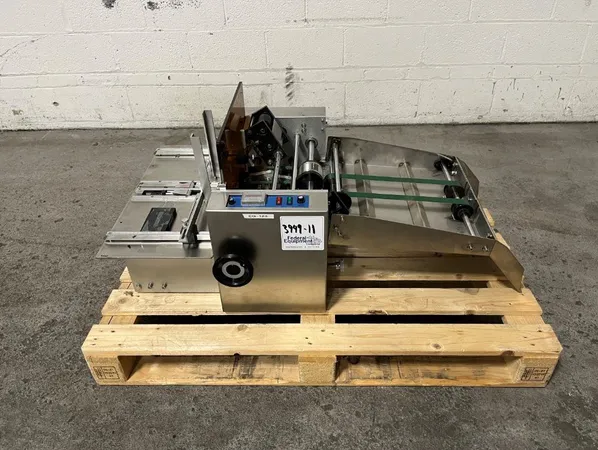 Wrap Around Jar Labeler.